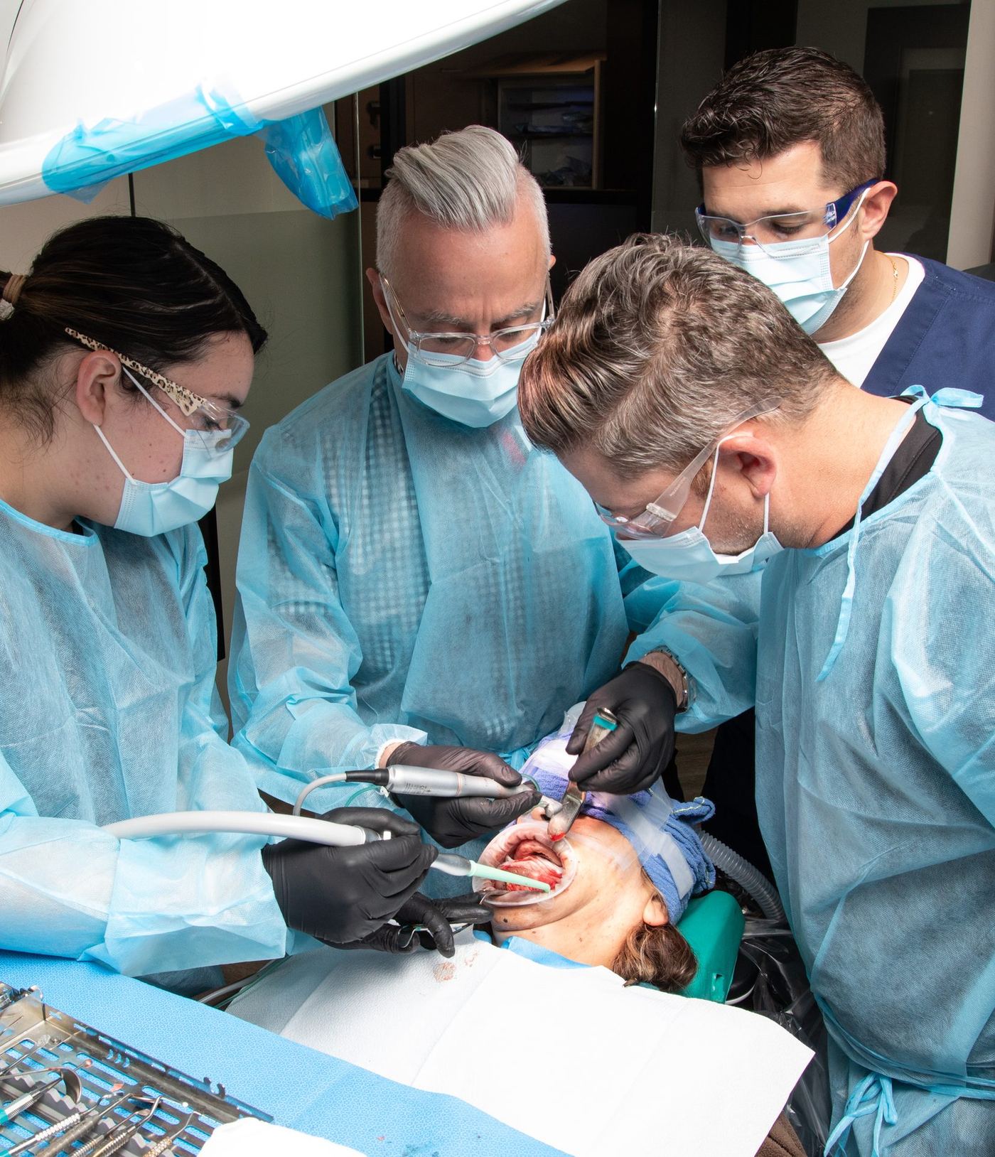 Dr. Joe Mehranfar performing a live All-on-4 full-arch case observed by course attendees