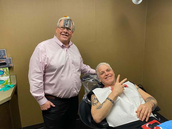 Implant Trainee and Happy Patient